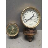 A Budenberg Gauge Company Limited 0-100 lbs pressure gauge and an oxygen cylinder pressure gauge.