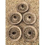 A set of five 18" wire wheels (17 1/2" diameter), splined hubs, possibly Riley.
