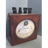 A wooden cased ammeter.