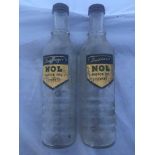 Two Duckham's NOL Motor Oil Thirty glass oil bottles.