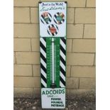 A Duckhams Adcoids Black and White enamel thermometer, in excellent condition and with good gloss,