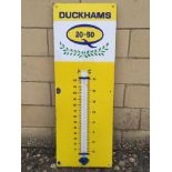 A Duckhams 20-50 enamel thermometer by Burnham of London, 13 x 36"