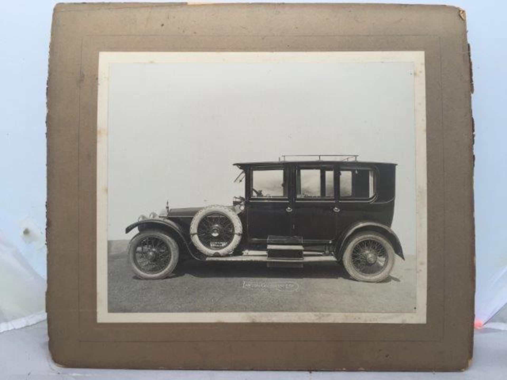 An original sepia coachbuilder's promotional photograph of a Rolls-Royce Silver Ghost, coachbuilt by