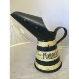 An unusual Morola Lubrication quart oil measure.