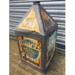 A Gamages Motor Oil five gallon pyramid can.