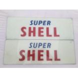 A pair of original Super Shell glass petrol pump brand plated panel signs.