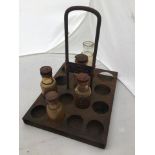 A rare Mixtrol for Motor Cars and Motorcycles salesman's sample kit comprising five glass bottles (