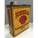 A Shell Lubricating Oil gallon can.