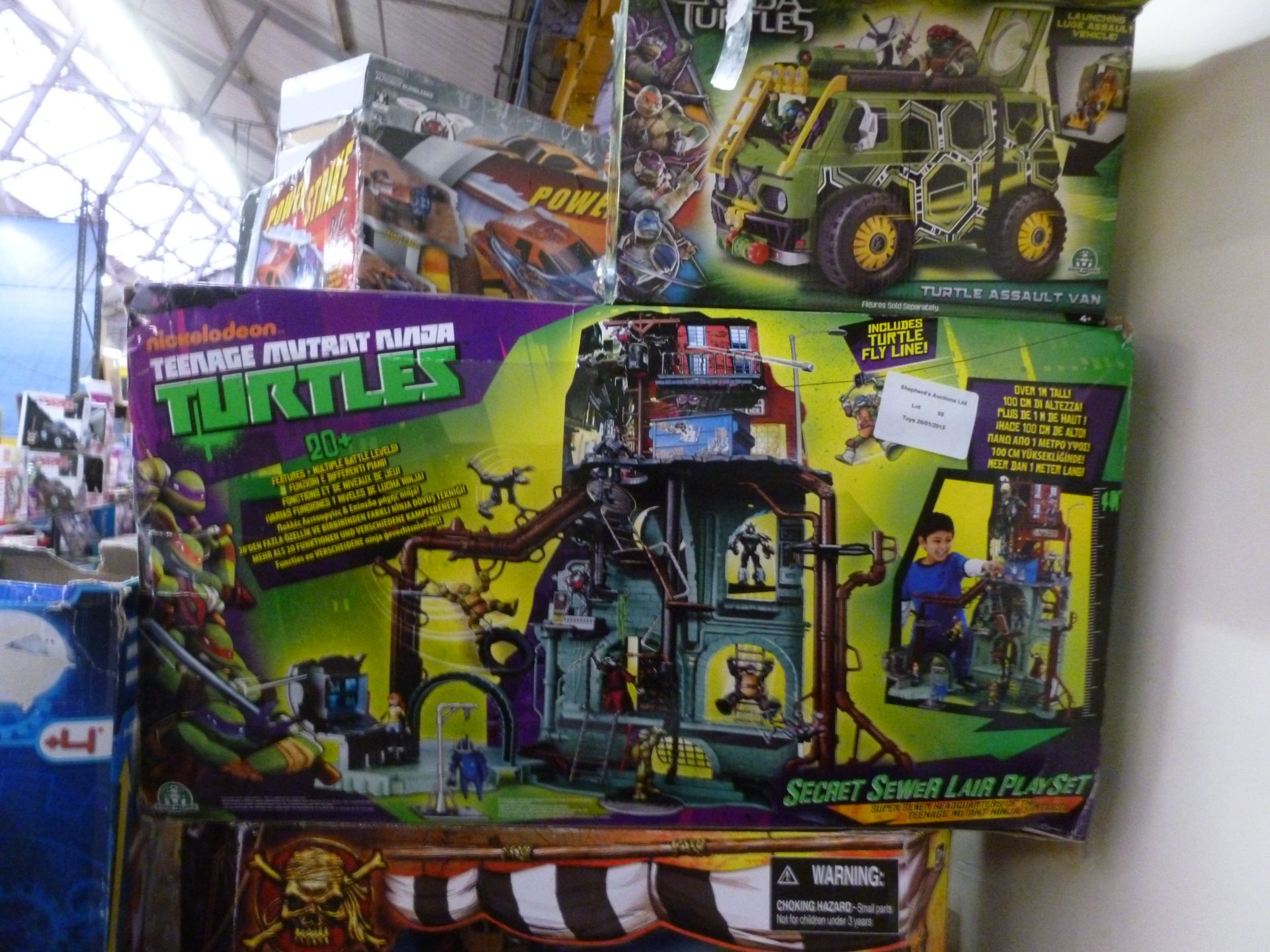 1x Teenage Ninja Turtles Secret Sewer Play Set. And 1x Turtle Assault Van. Looks in good