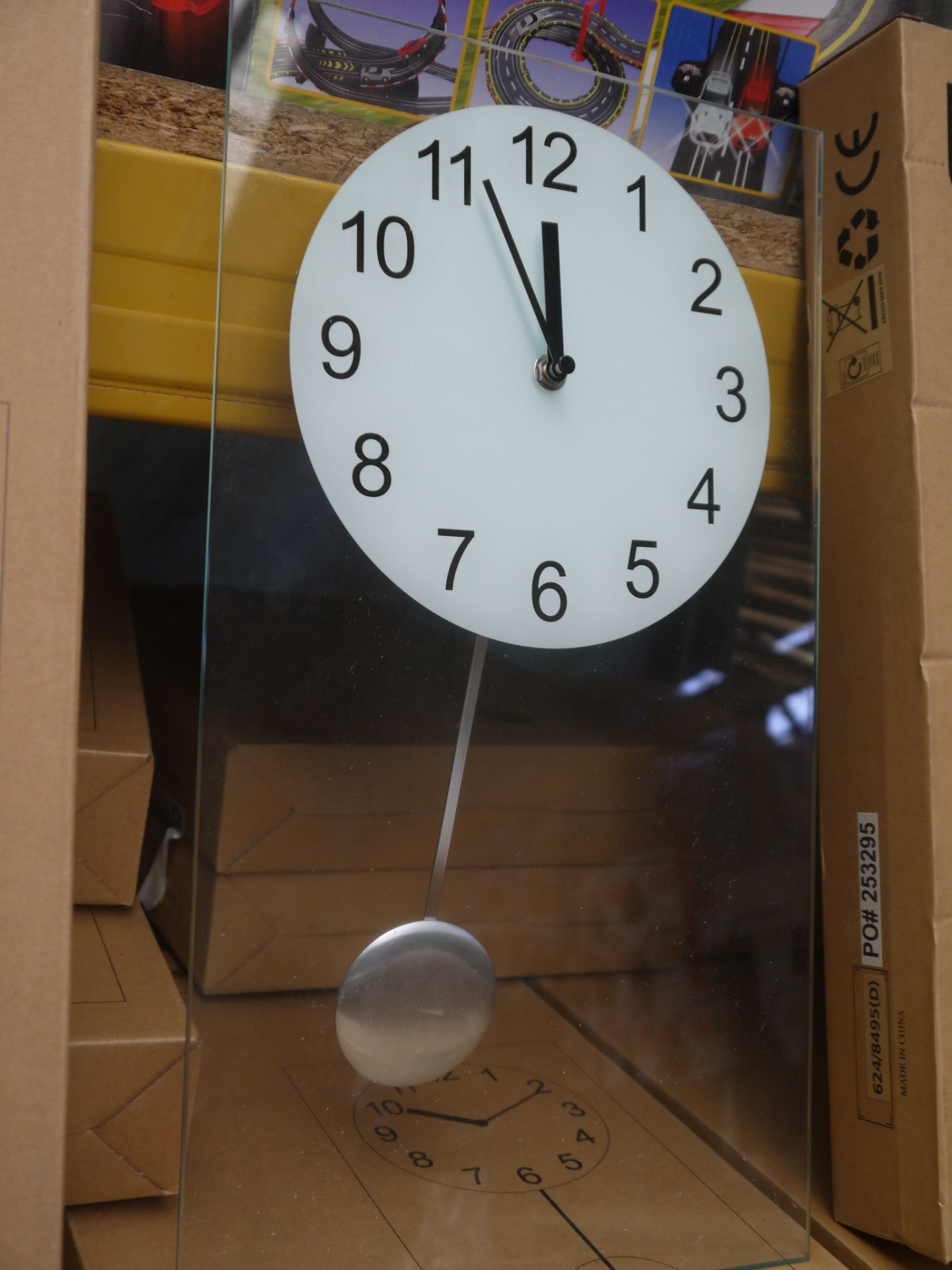 Living clear glass pendulum clock 45x25cm, boxed