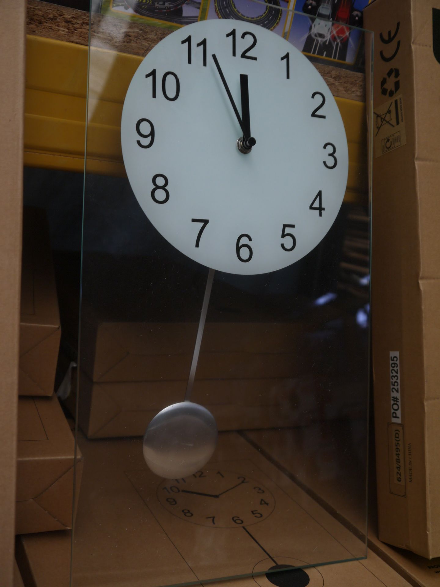 Living clear glass pendulum clock 45x25cm, boxed