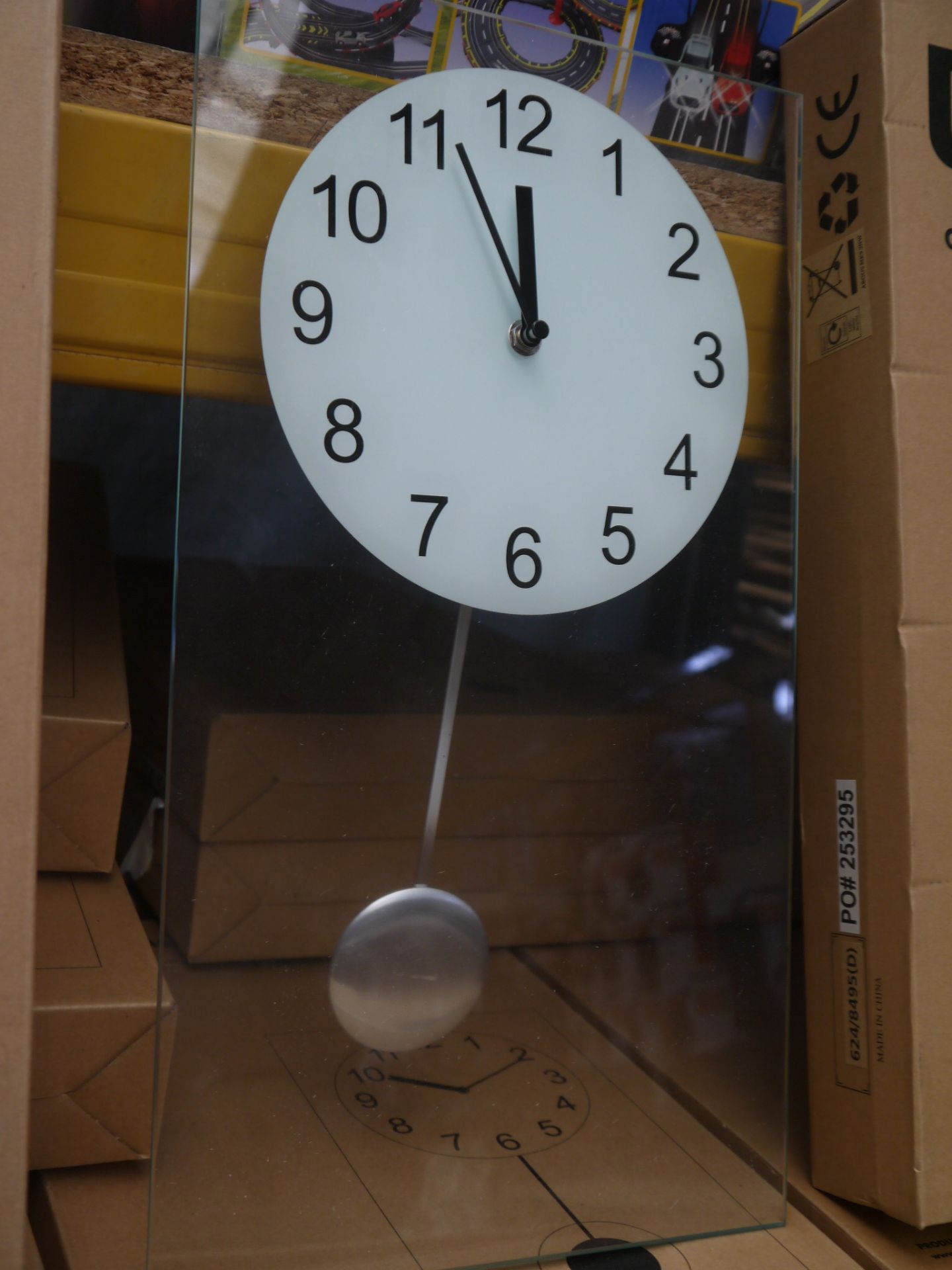 Living clear glass pendulum clock 45x25cm, boxed