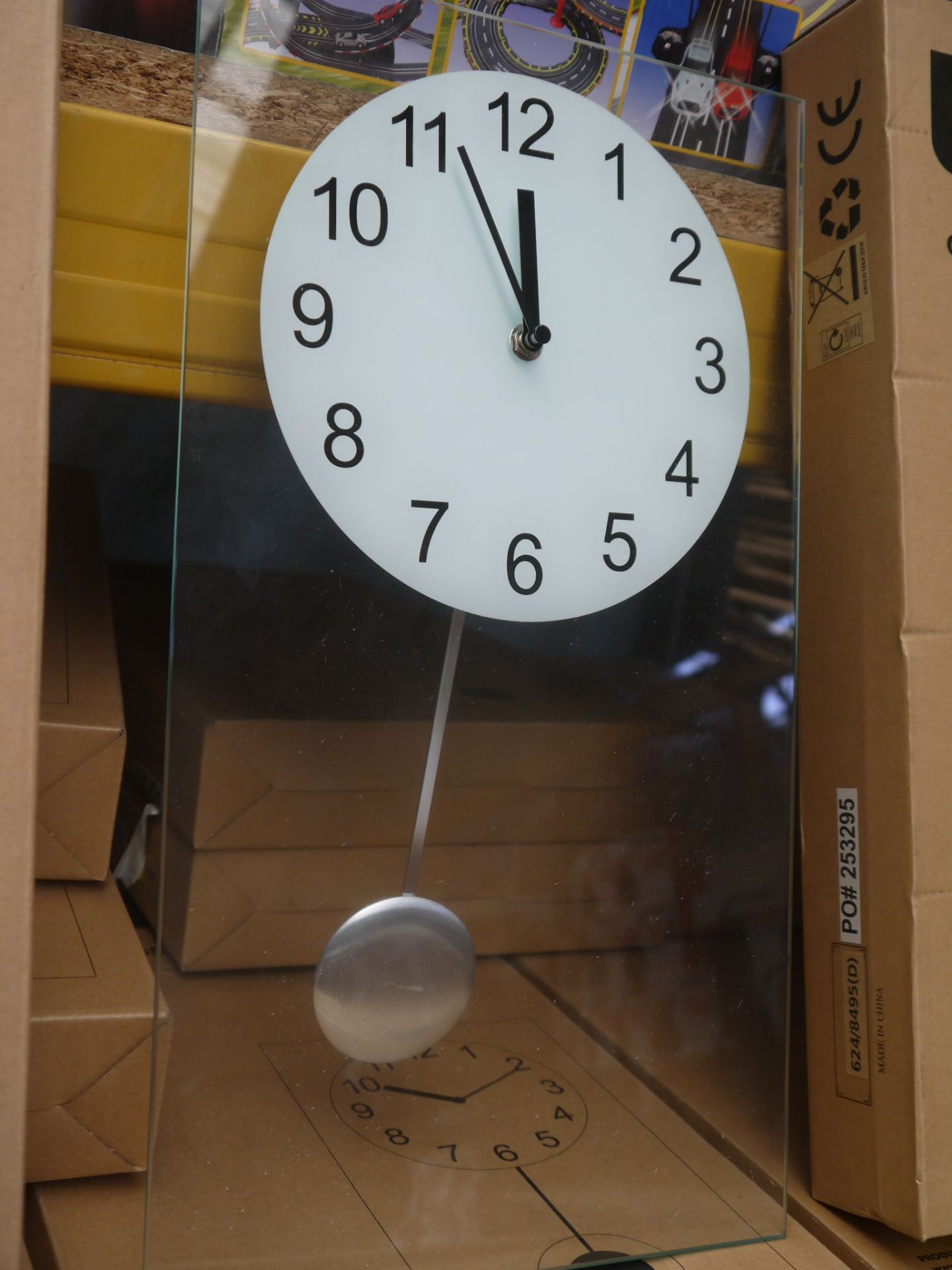 Living clear glass pendulum clock 45x25cm, boxed