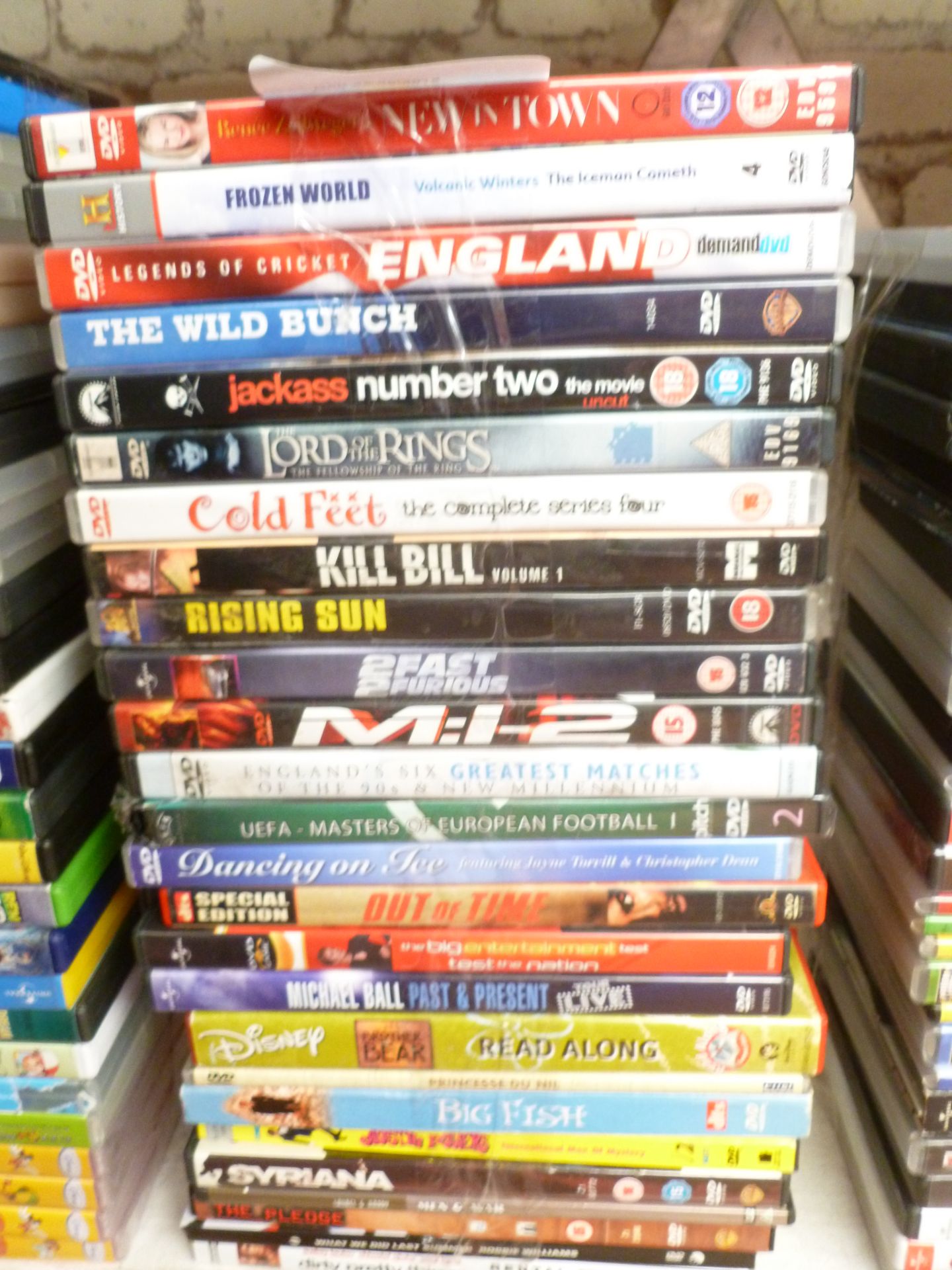 Approximately 25 DVD's, includes Jackass, Lord of the Rings, Rising Sun and more.