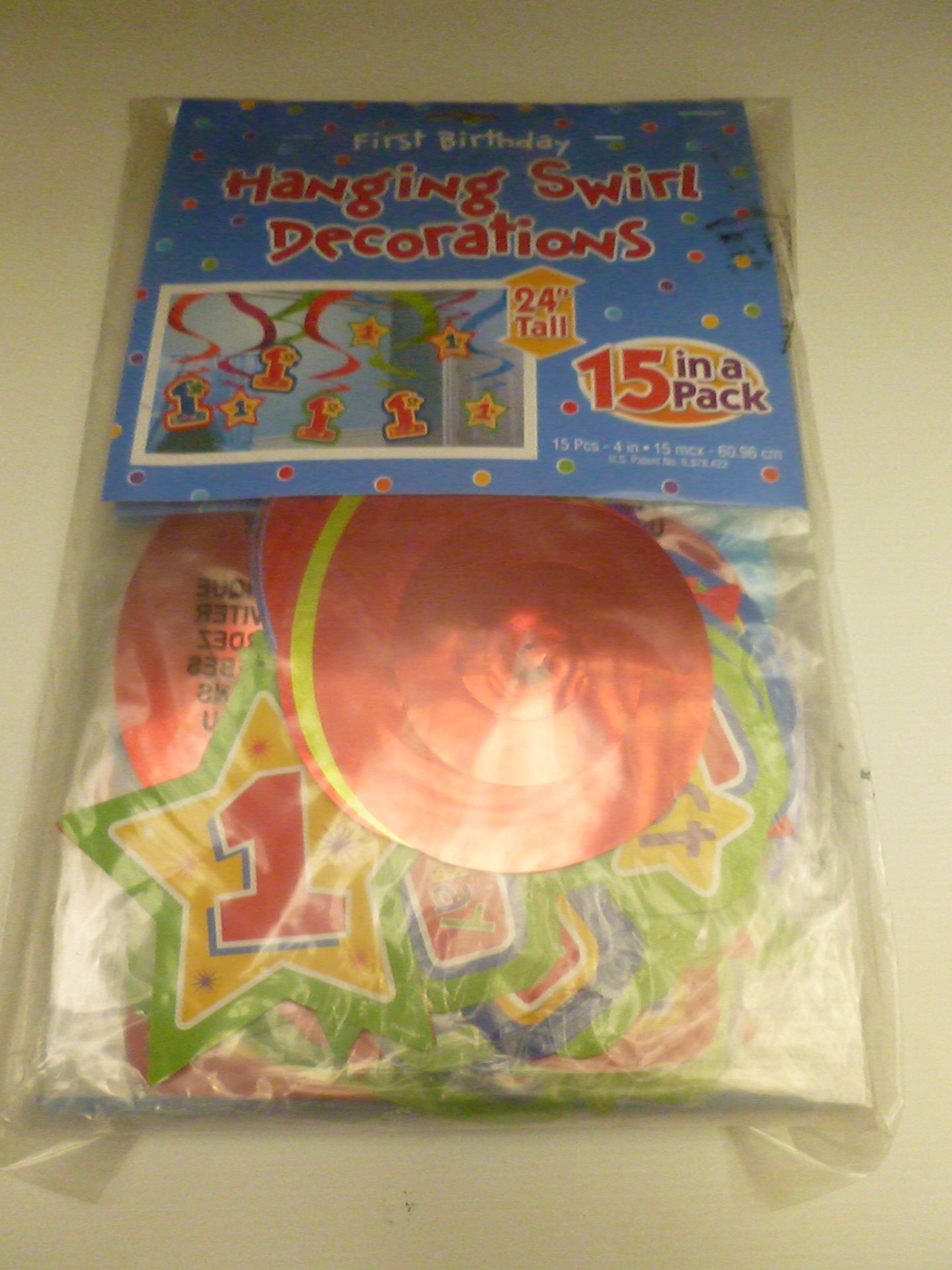 12 packs of 6 each containing 15 individual 1st Birthday Hanging Swirl Decorations, 24'' Tall.