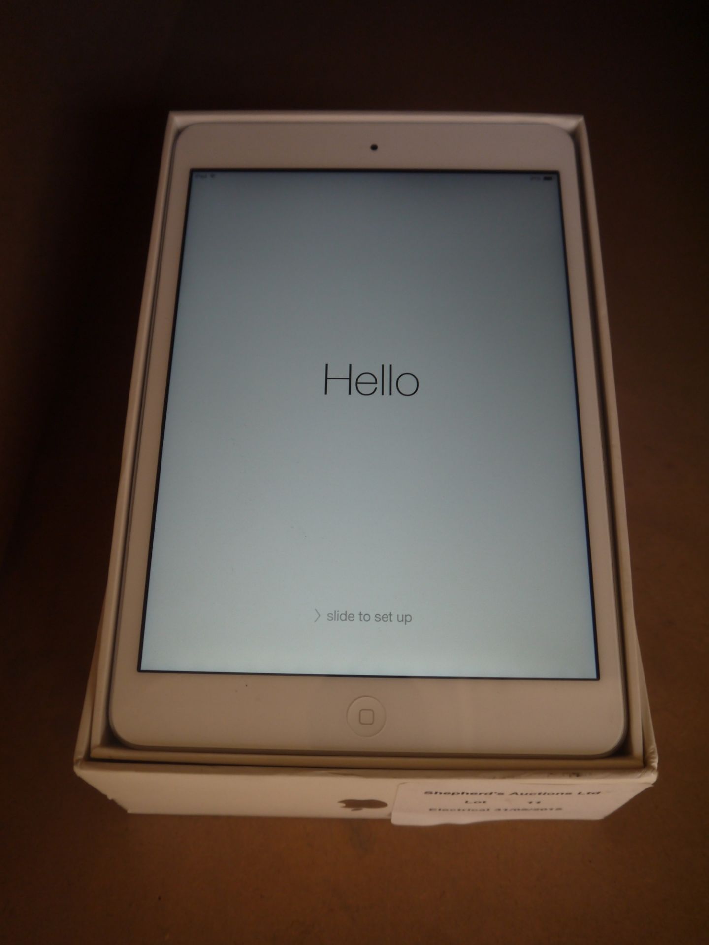 Apple iPad Mini 2, 32GB with retina display, working, on first person set up with original box but