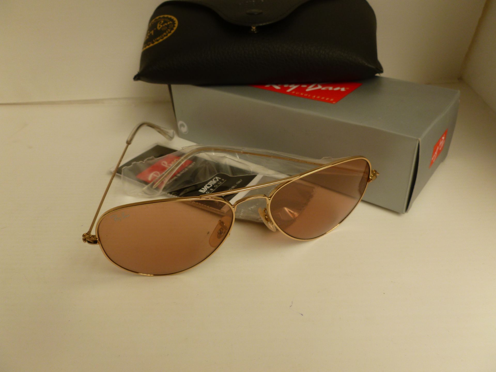 Ray Ban Aviator Sunglasses with gold coloured frame, new and boxed with carry case cleaning cloth