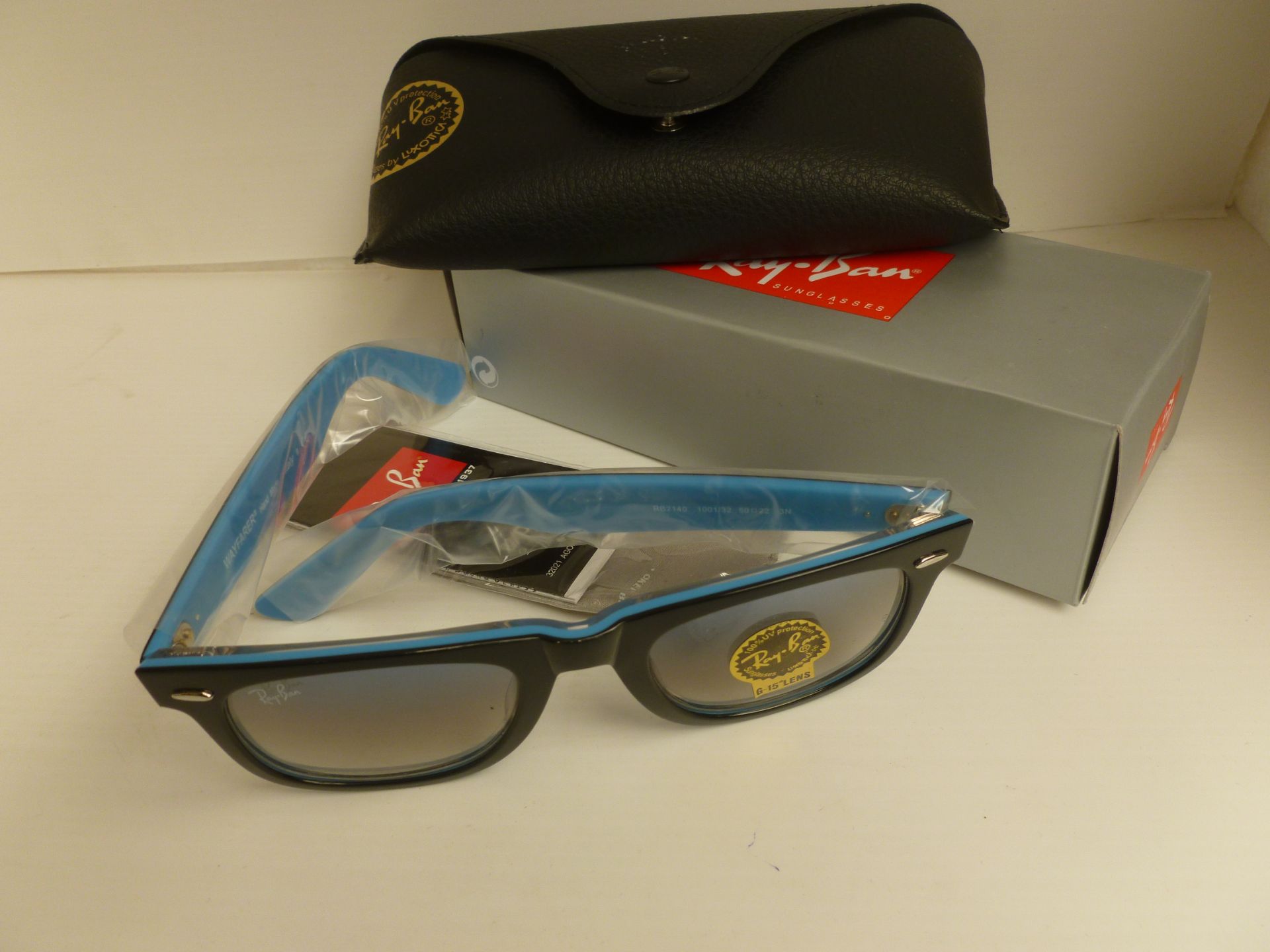 Ray Ban Way Farer Sunglasses with black outer frame & Blue inner frame new and boxed with carry case