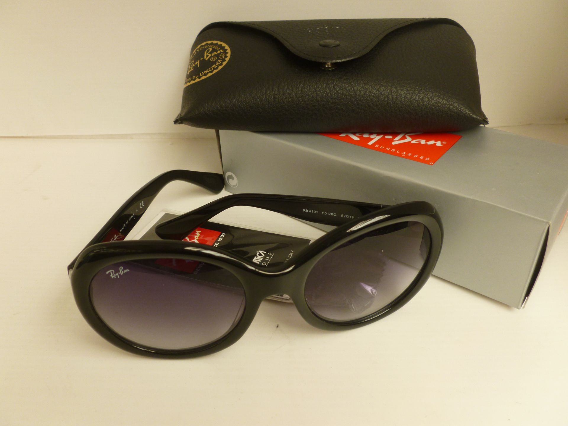 Ray Ban Clam Shell Sunglasses with black frame, new and boxed with carry case cleaning cloth etc