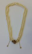 Two Strand Pearl Necklace with Flower Clasp
