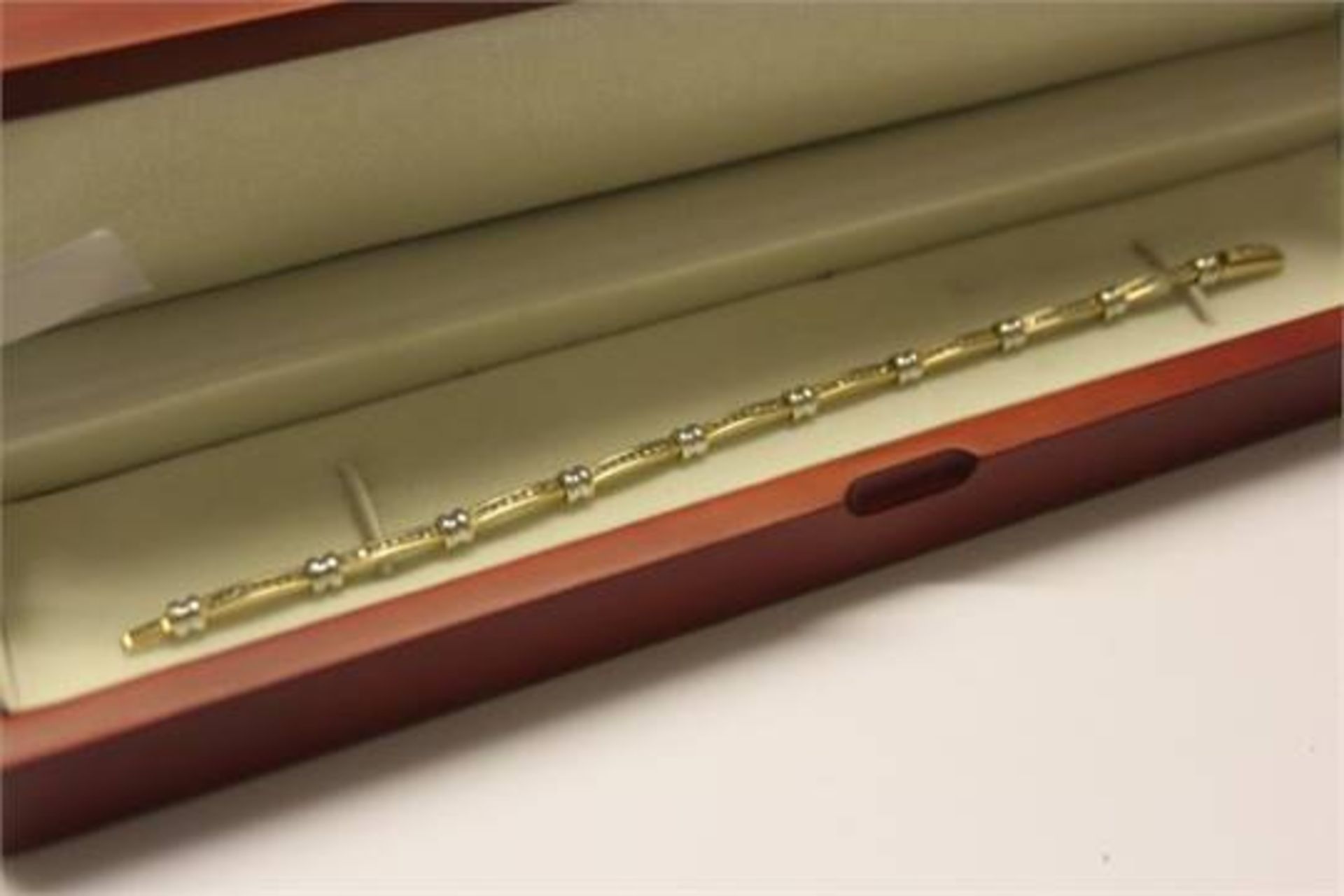 9CT GOLD LADIES DIAMOND CHANNEL SET BRACELET ***PLEASE NOTE THERE IS NO VAT ON THIS LOT***