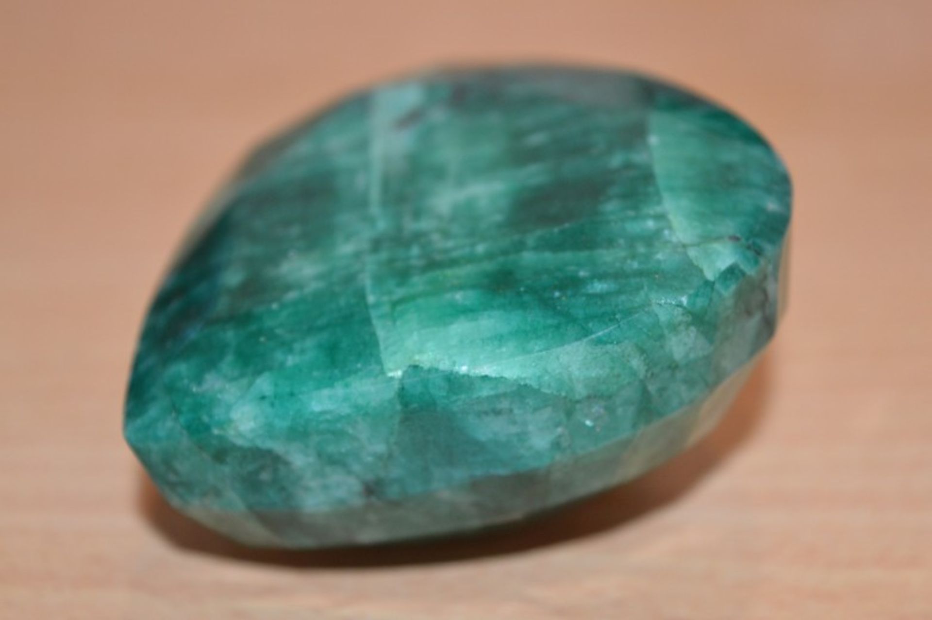 **IDENTITY: GREEN BERYL, MMTS: 66.76X66.17X35.14, CARATS/COUNTS: 984.70CTS/1, SHAPE: PEAR (FACTED) - Image 2 of 3