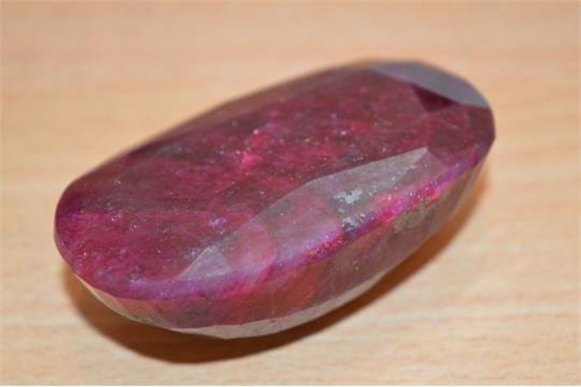 ** IDENTITY: RUBY (CORUNDUM) MMTS: 63.60X35.93X24.51XMM, CARATS/COUNT: 618.75 CTS/1, SHAPE: OVAL ( - Image 2 of 3