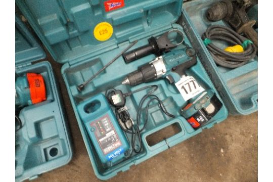 Makita 8444D hammer drill, battery charger