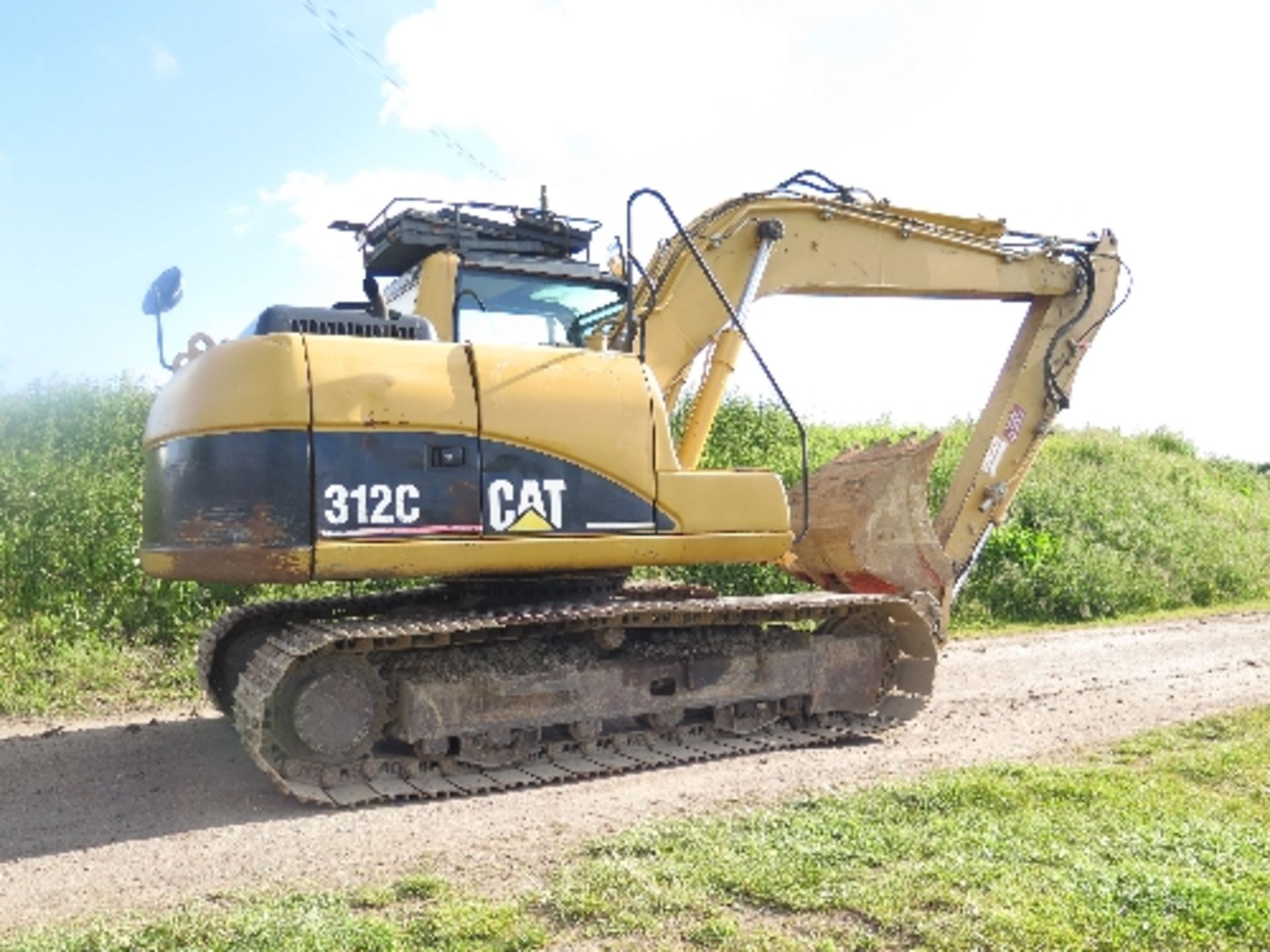Caterpillar 312C excavator 3164 hrs 2006 145525ALL LOTS are SOLD AS SEEN WITHOUT WARRANTY expressed,