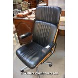 1970S BLACK LEATHER AND PLYWOOD BACKED SWIVEL CHAIR IN THE STYLE OF THE EAMES BROS