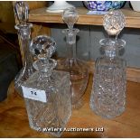 FOUR VARIOUS GLASS DECANTERS