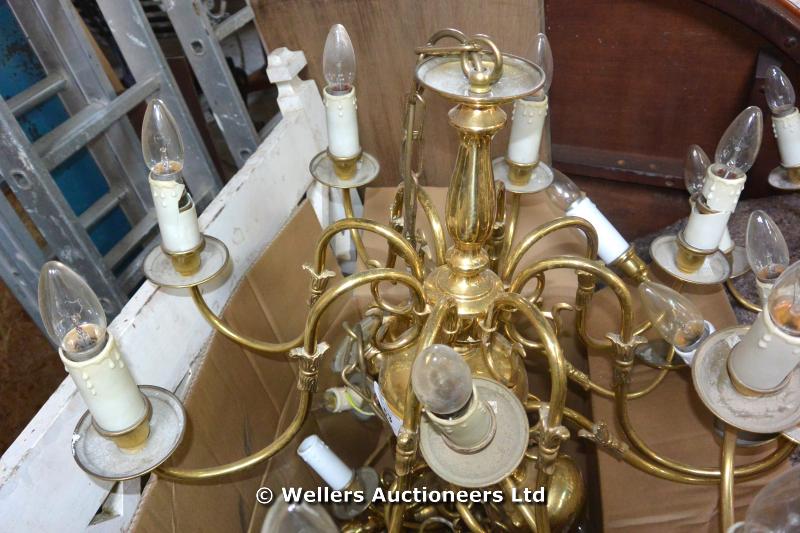 AN 8 BRANCH BRASS CHANDELIER, BULBOUS SUPPORT AND SCROLL ARMS