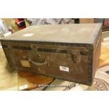 EARLY 20TH CENTURY BRASS BOUND TRAVELLING TRUNK WITH VINTAGE LABELS, 760 LONG