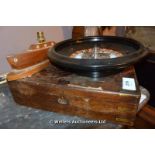 19TH CENTURY MILITARY BRASS BOUND BOX ALONG WITH A VINTAGE ROULETTE WHEEL AND A WOODEN BOAT LAMP