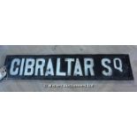 A CAST IRON STREET SIGN 'GIBRALTAR SQUARE', 730 LONG