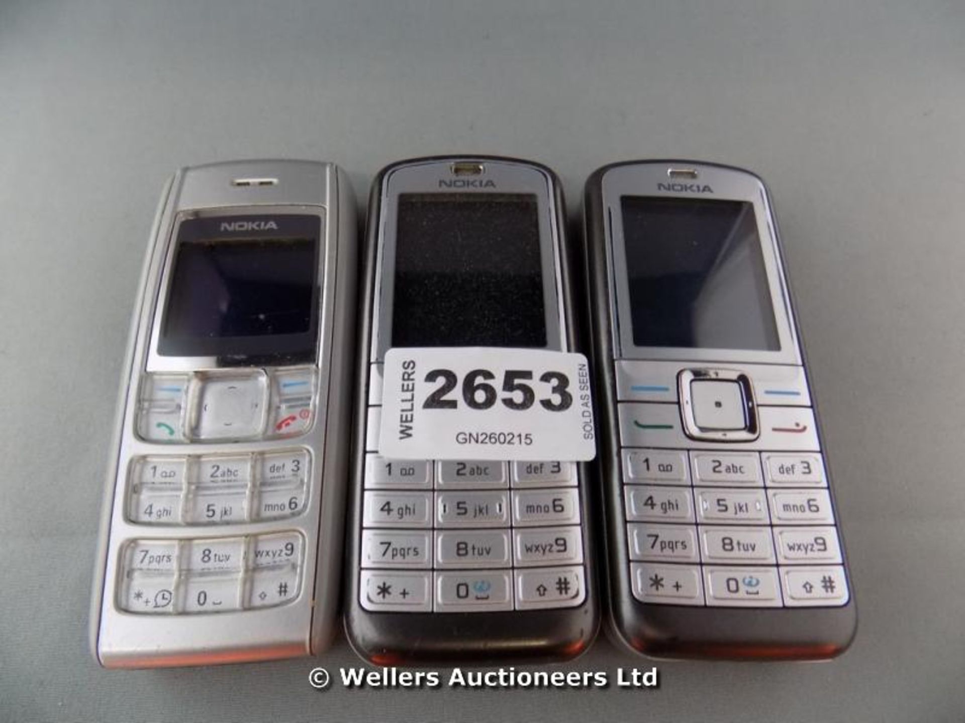 *BAG OF 3 NOKIA MOBILE PHONES MODEL 6070 AND MODEL 1600 GREY / GRADE: UNCLAIMED PROPERTY /