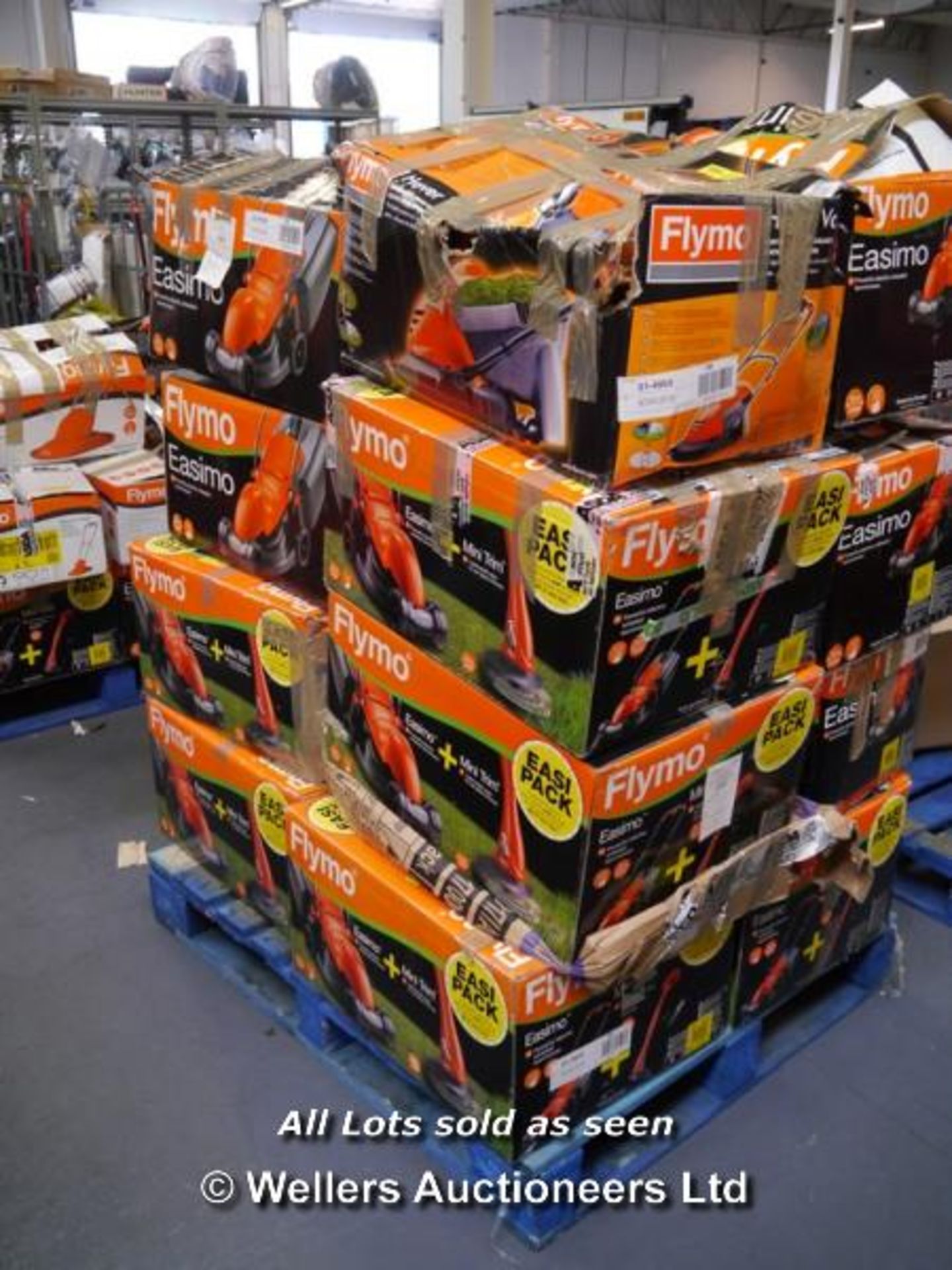 *1X MIXED PALLET OF APPROX 15X BOXED FLYMO LAWN MOWERS INCLUDING EASIMO, EASIMO WITH MINI TRIM.   ( - Image 2 of 2