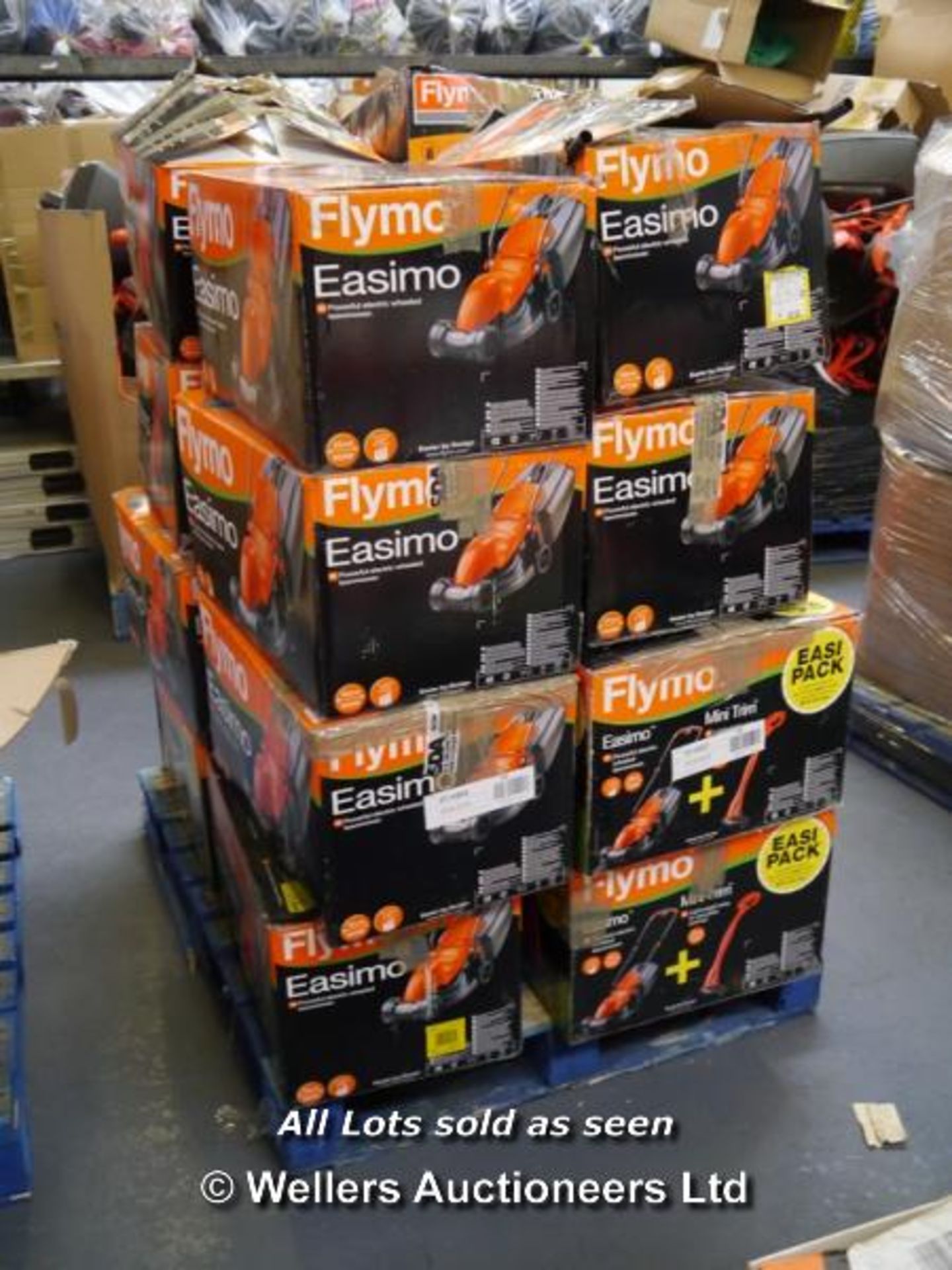 *1X MIXED PALLET OF APPROX 15X BOXED FLYMO LAWN MOWERS INCLUDING EASIMO, EASIMO WITH MINI TRIM.   (