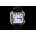 Ladies' Cartier wristwatch, after set diamond bezel, 18ct yellow gold case and buckle on a black