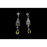 Peridot and diamond drop earrings, thirty-six Swiss cut diamonds mounted in ornate panels, with