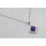 Amethyst and diamond pendant, square step cut amethyst surrounded by round brilliant cut diamonds in