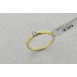 Single stone diamond ring, round brilliant cut diamond, mounted in 18ct yellow and white gold,
