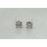 Single stone diamond stud earrings, round brilliant cut diamonds, estimated total diamond weight 0.