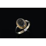 Agate intaglio ring, intaglio carved to depict two birds, set in 14ct yellow gold, ring size M