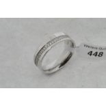 Diamond set wedding band, round brilliant cut diamond set in a undulating line, mounted in platinum,