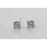 Single stone diamond stud earrings, round brilliant cut diamonds, estimated total diamond weight 0.