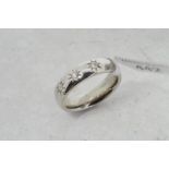 Three stone diamond ring, three round brilliant cut diamonds, gypsy set 9ct white gold, ring size