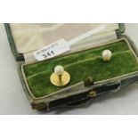 Pearl dress studs, white round pearls mounted in yellow metal stamped 18ct, with original box