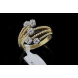 Floral five row diamond set dress ring, round brilliant cut diamonds in five flower clusters, with