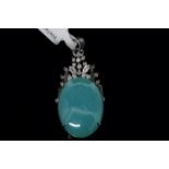 Blue stone and diamond pendant, oval cabochon cut blue stone, with twenty round cut diamonds,